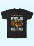 INSTALLING MUSCLES PLEASE WAIT T-SHIRT